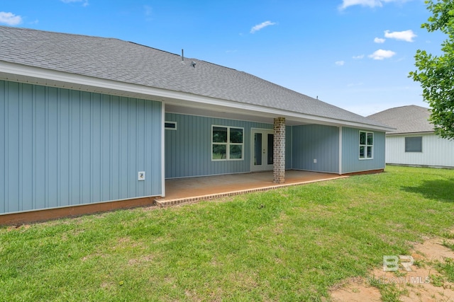 1819 Mary Jane Dr, Bay Minette, AL 36507 - rear view of house featuring a yard, a patio, french doors, and roof with shingles