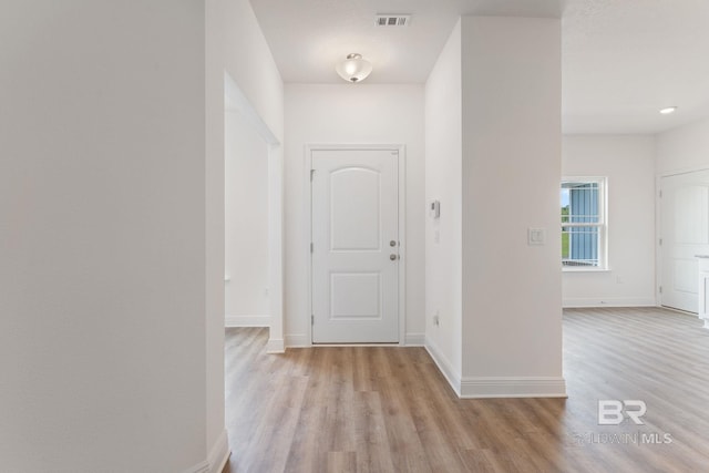 1819 Mary Jane Dr, Bay Minette, AL 36507 - foyer entrance featuring baseboards, visible vents, and light wood-type flooring