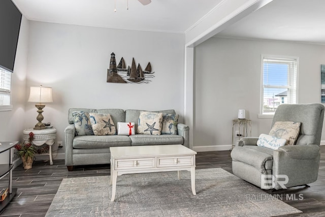 467 W Bernard Ct, Gulf Shores, AL 36542 - living area with ornamental molding, baseboards, dark wood-style flooring, and a ceiling fan