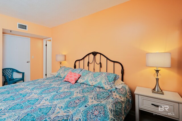 bedroom with a textured ceiling