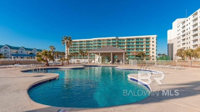 view of pool featuring a patio area