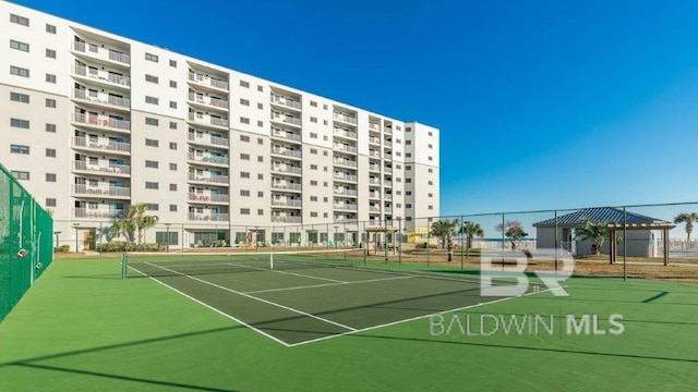 view of tennis court with a gazebo