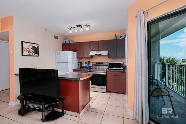 kitchen with appliances with stainless steel finishes, track lighting, dark brown cabinets, a textured ceiling, and light tile patterned floors