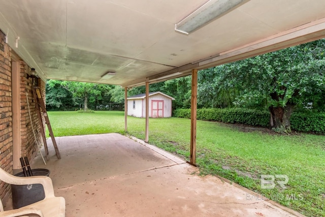 3909 Blue Gill Cir, Mobile, AL 36619 - view of patio / terrace featuring a shed