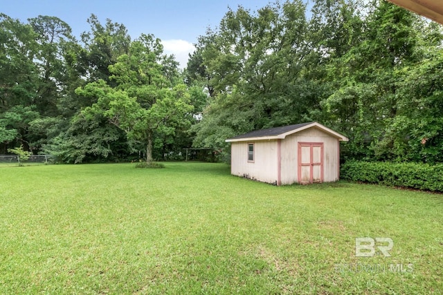 3909 Blue Gill Cir, Mobile, AL 36619 - view of yard featuring a storage unit