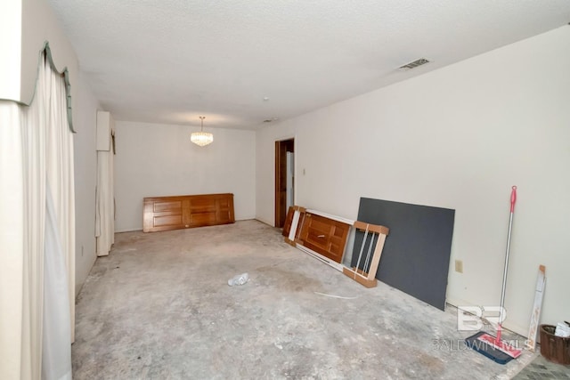 3909 Blue Gill Cir, Mobile, AL 36619 - unfurnished room with a chandelier