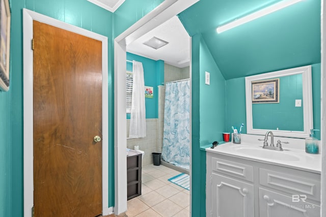 bathroom featuring tile walls, vanity, a shower with shower curtain, and tile patterned floors