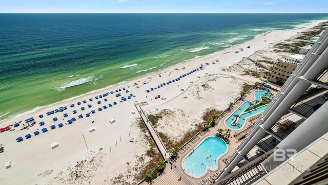 drone / aerial view with a view of the beach and a water view