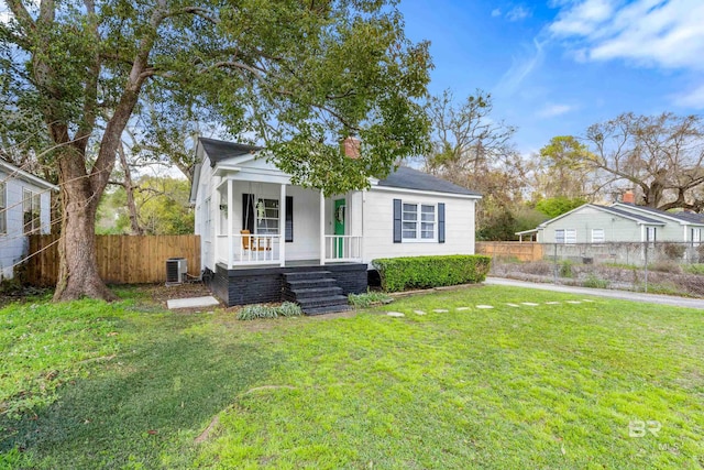 208 Pinehill Dr, Mobile, AL 36606 - view of front of property featuring a porch, central air condition unit, a chimney, and stairway