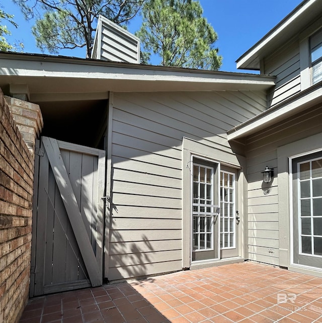 exterior space featuring a gate