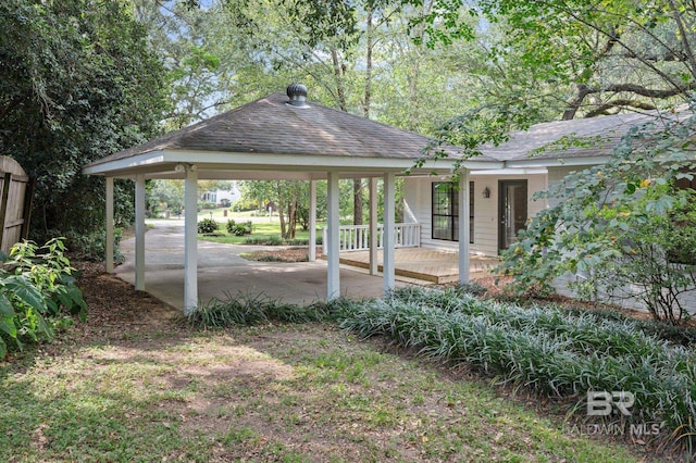 view of yard with a patio area, a carport, and a gazebo