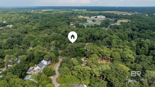 bird's eye view featuring a forest view