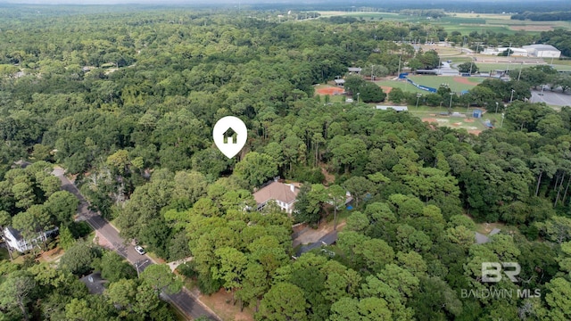 bird's eye view featuring a forest view