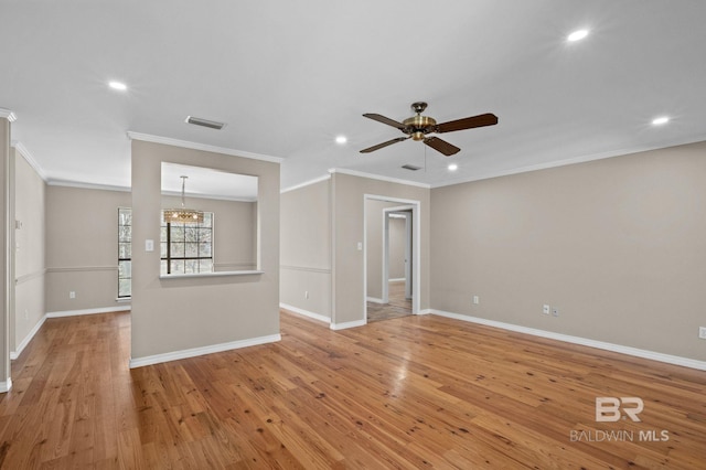 empty room with light wood finished floors, recessed lighting, visible vents, baseboards, and ceiling fan with notable chandelier