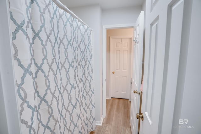 bathroom featuring hardwood / wood-style flooring