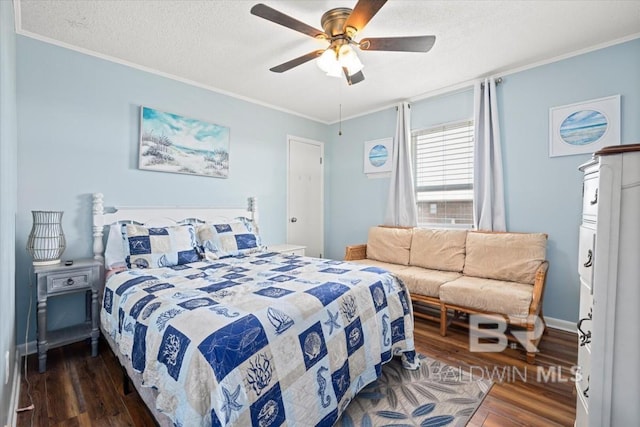 108 Ponchartrain Ct, Dauphin Island, AL 36528 - bedroom with dark wood-type flooring, ornamental molding, ceiling fan, and a textured ceiling