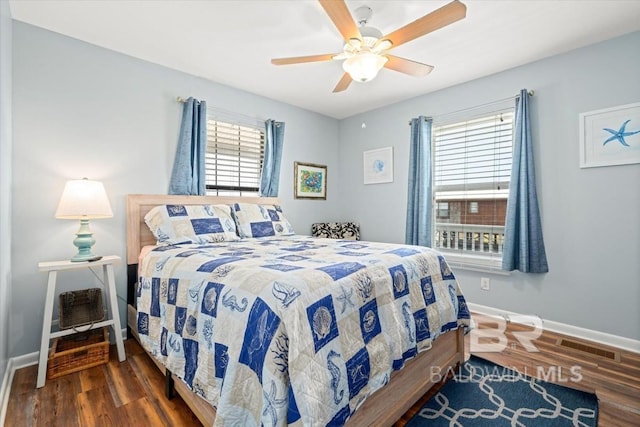 108 Ponchartrain Ct, Dauphin Island, AL 36528 - bedroom with wood finished floors and a ceiling fan