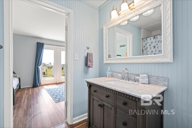 108 Ponchartrain Ct, Dauphin Island, AL 36528 - full bath with vanity, hardwood / wood-style floors, and french doors