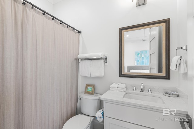 2457 Saltgrass Way Unit 8, Orange Beach, AL 36561 - bathroom with toilet, curtained shower, and vanity