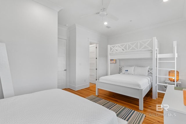2457 Saltgrass Way Unit 8, Orange Beach, AL 36561 - bedroom featuring recessed lighting, light wood-style flooring, baseboards, and crown molding