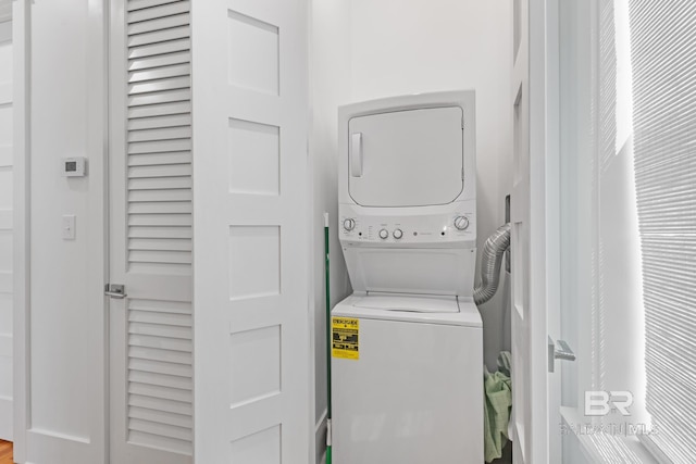 2457 Saltgrass Way Unit 8, Orange Beach, AL 36561 - washroom featuring stacked washer and dryer and laundry area