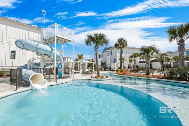 2457 Saltgrass Way Unit 8, Orange Beach, AL 36561 - community pool with fence and a water slide