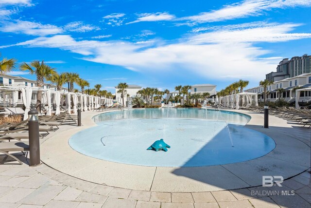 2457 Saltgrass Way Unit 8, Orange Beach, AL 36561 - community pool with a patio and a residential view