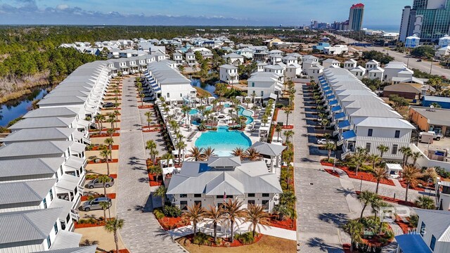 2457 Saltgrass Way Unit 8, Orange Beach, AL 36561 - bird's eye view with a water view and a residential view