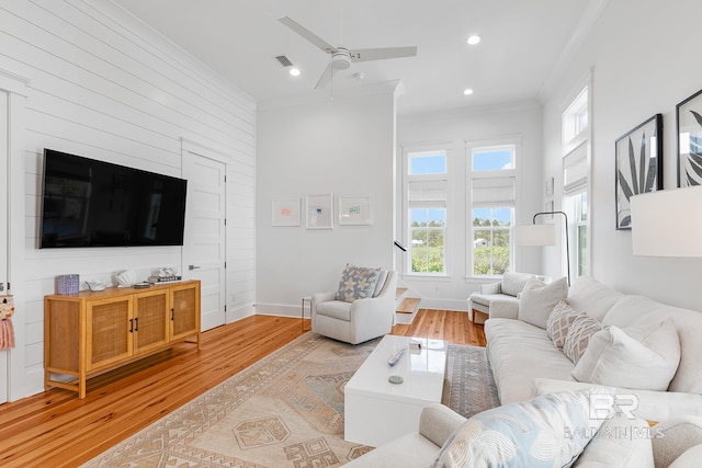 2457 Saltgrass Way Unit 8, Orange Beach, AL 36561 - living area featuring crown molding, light wood-style floors, a ceiling fan, recessed lighting, and baseboards