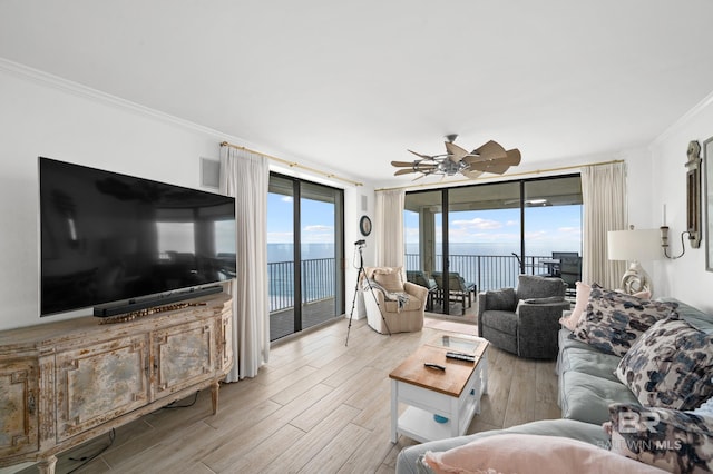24900 Perdido Beach Blvd Unit 1001, Orange Beach, AL 36561 - living room featuring light hardwood / wood-style floors, expansive windows, ornamental molding, and ceiling fan