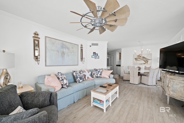 24900 Perdido Beach Blvd Unit 1001, Orange Beach, AL 36561 - living room featuring ceiling fan, crown molding, and light hardwood / wood-style flooring