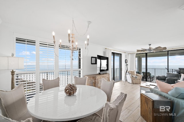 24900 Perdido Beach Blvd Unit 1001, Orange Beach, AL 36561 - dining space featuring plenty of natural light, expansive windows, and ornamental molding