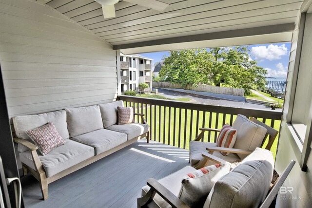 210 S Mobile St Unit 16, Fairhope, AL 36532 - wooden deck featuring a ceiling fan and a yard