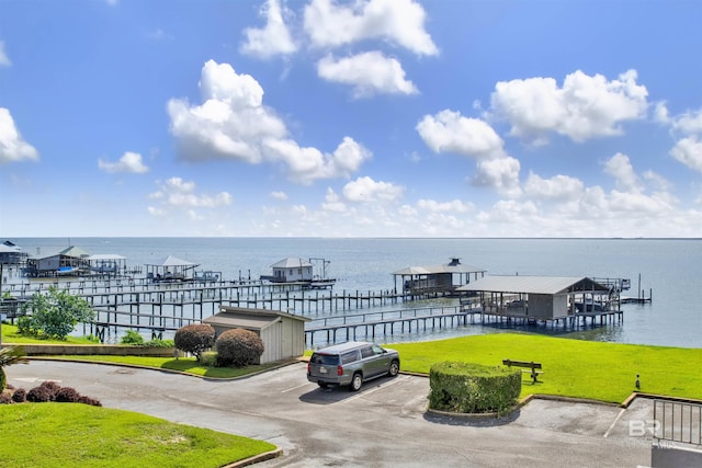 210 S Mobile St Unit 16, Fairhope, AL 36532 - view of patio featuring a water view and a boat dock
