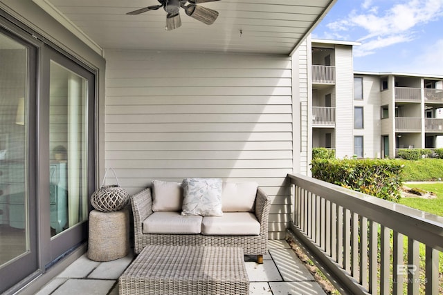 210 S Mobile St Unit 16, Fairhope, AL 36532 - balcony with ceiling fan and an outdoor living space