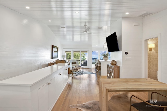 210 S Mobile St Unit 16, Fairhope, AL 36532 - corridor featuring light wood-style flooring and recessed lighting