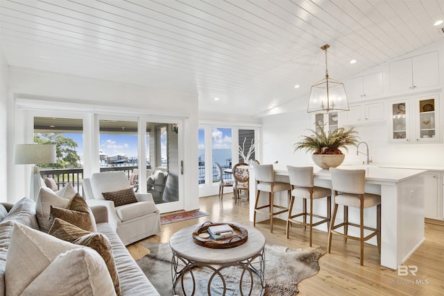 210 S Mobile St Unit 16, Fairhope, AL 36532 - living room featuring light wood-style floors, recessed lighting, a chandelier, and wood ceiling