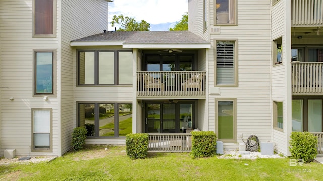210 S Mobile St Unit 16, Fairhope, AL 36532 - rear view of house with a yard
