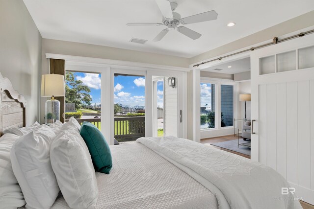 210 S Mobile St Unit 16, Fairhope, AL 36532 - bedroom with access to outside, multiple windows, recessed lighting, and ceiling fan