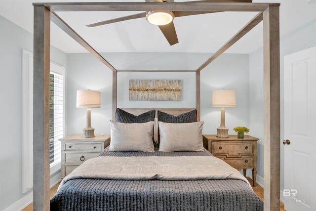 210 S Mobile St Unit 16, Fairhope, AL 36532 - bedroom with light wood-style floors, ceiling fan, and baseboards