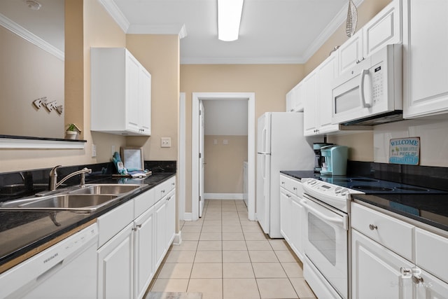 kitchen with white cabinets, white appliances, crown molding, and sink