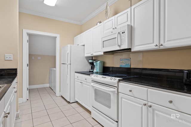 kitchen featuring white cabinetry, crown molding, white appliances, washer / dryer, and light tile patterned flooring