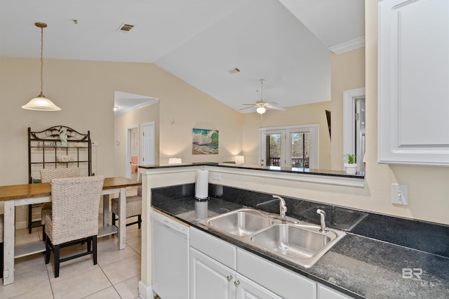 kitchen featuring white cabinets, vaulted ceiling, crown molding, sink, and dishwasher