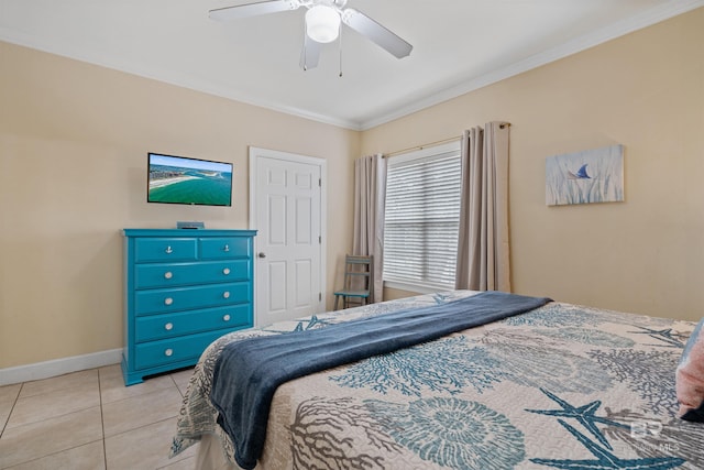 tiled bedroom with ceiling fan and crown molding