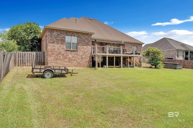 24085 Trowbridge Ct, Daphne, AL 36256 - back of house with brick siding, a hot tub, and a wooden deck