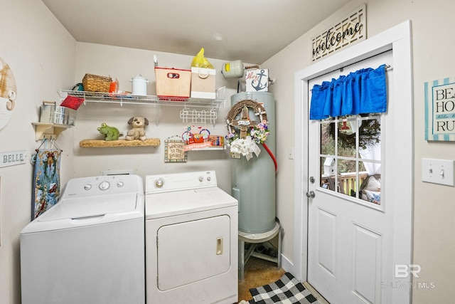 laundry room featuring washer and dryer, laundry area, and water heater