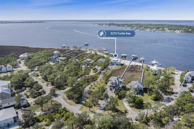 aerial view with a water view and a residential view