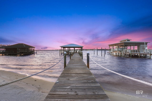 view of dock with a water view and boat lift