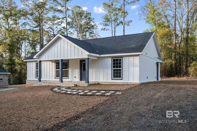 modern inspired farmhouse with a porch