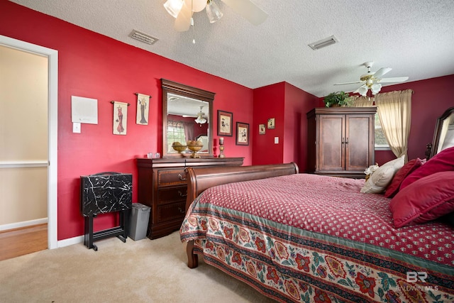 517 Simms Dr, Saraland, AL 36571 - bedroom with ceiling fan, carpet floors, and a textured ceiling